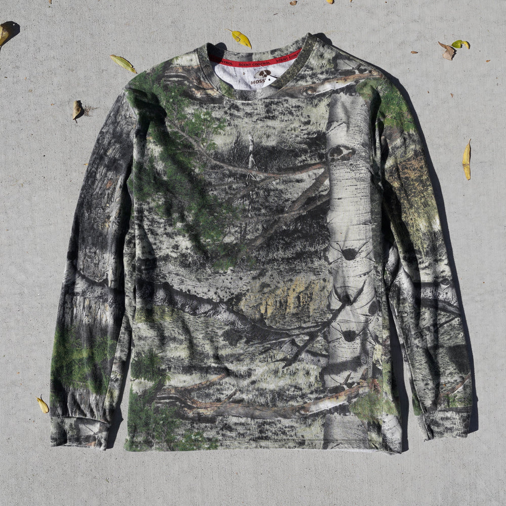 Reworked vintage Mossy Oak camo long sleeve tee – 2000s style, screen printed in Wyoming, handcrafted outdoor apparel from the Vintage Wyoming Gear Collection at West Block Vintage.