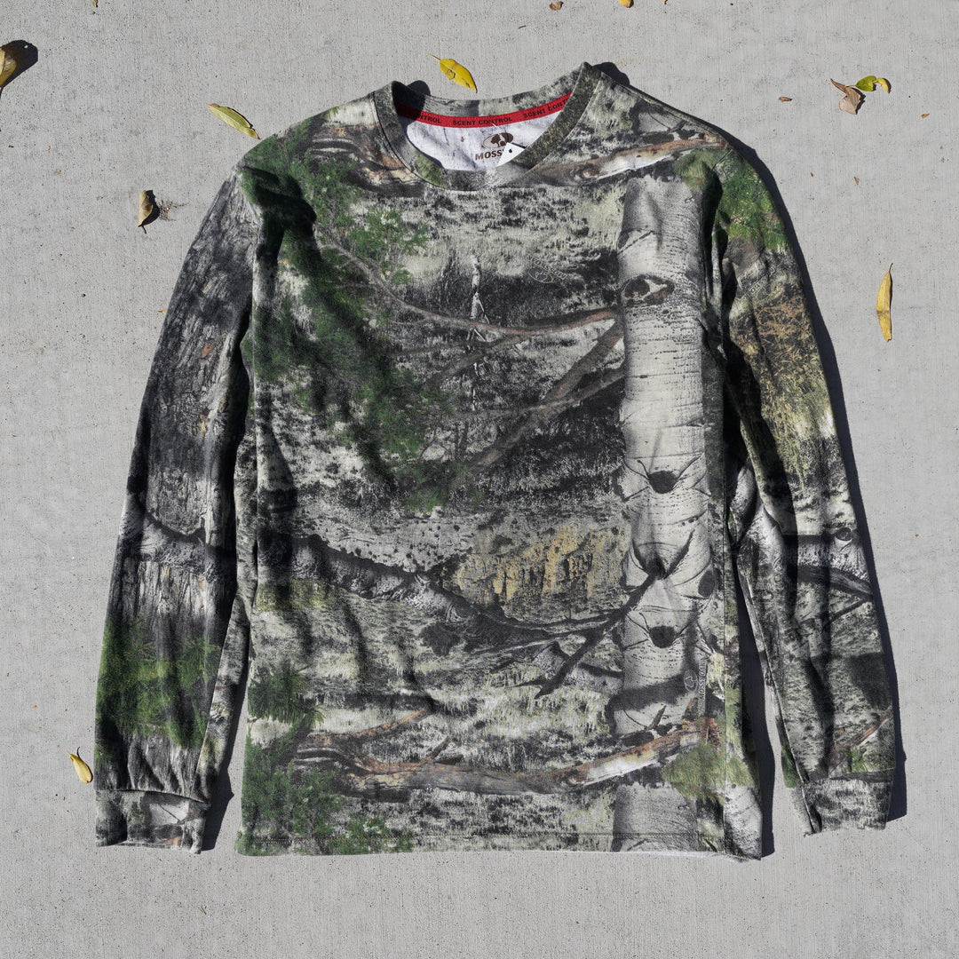 Reworked vintage Mossy Oak camo long sleeve tee – 2000s style, screen printed in Wyoming, handcrafted outdoor apparel from the Vintage Wyoming Gear Collection at West Block Vintage.