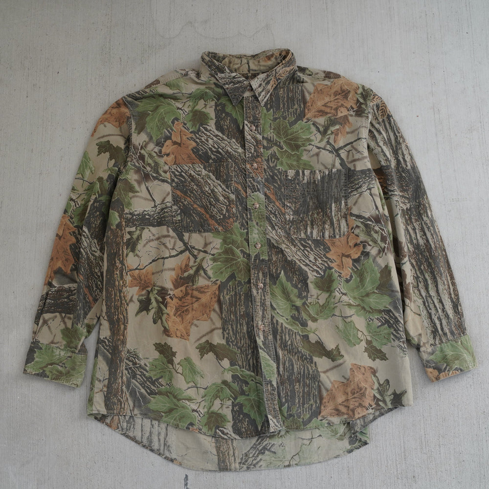 Reworked vintage 2000s Wrangler Rugged Wear camo field shirt – handcrafted Wyoming outdoor apparel from the Vintage Wyoming Gear Collection at West Block Vintage.