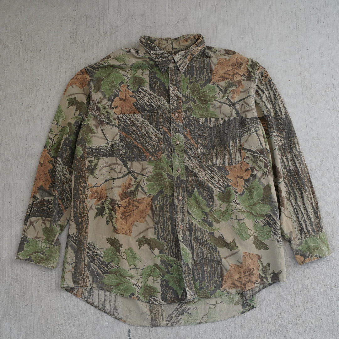 Reworked vintage 2000s Wrangler Rugged Wear camo field shirt – handcrafted Wyoming outdoor apparel from the Vintage Wyoming Gear Collection at West Block Vintage.