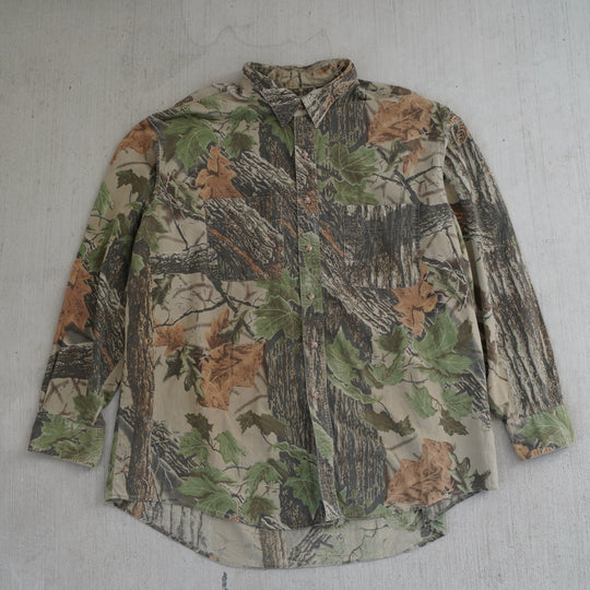 Reworked vintage 2000s Wrangler Rugged Wear camo field shirt – handcrafted Wyoming outdoor apparel from the Vintage Wyoming Gear Collection at West Block Vintage.