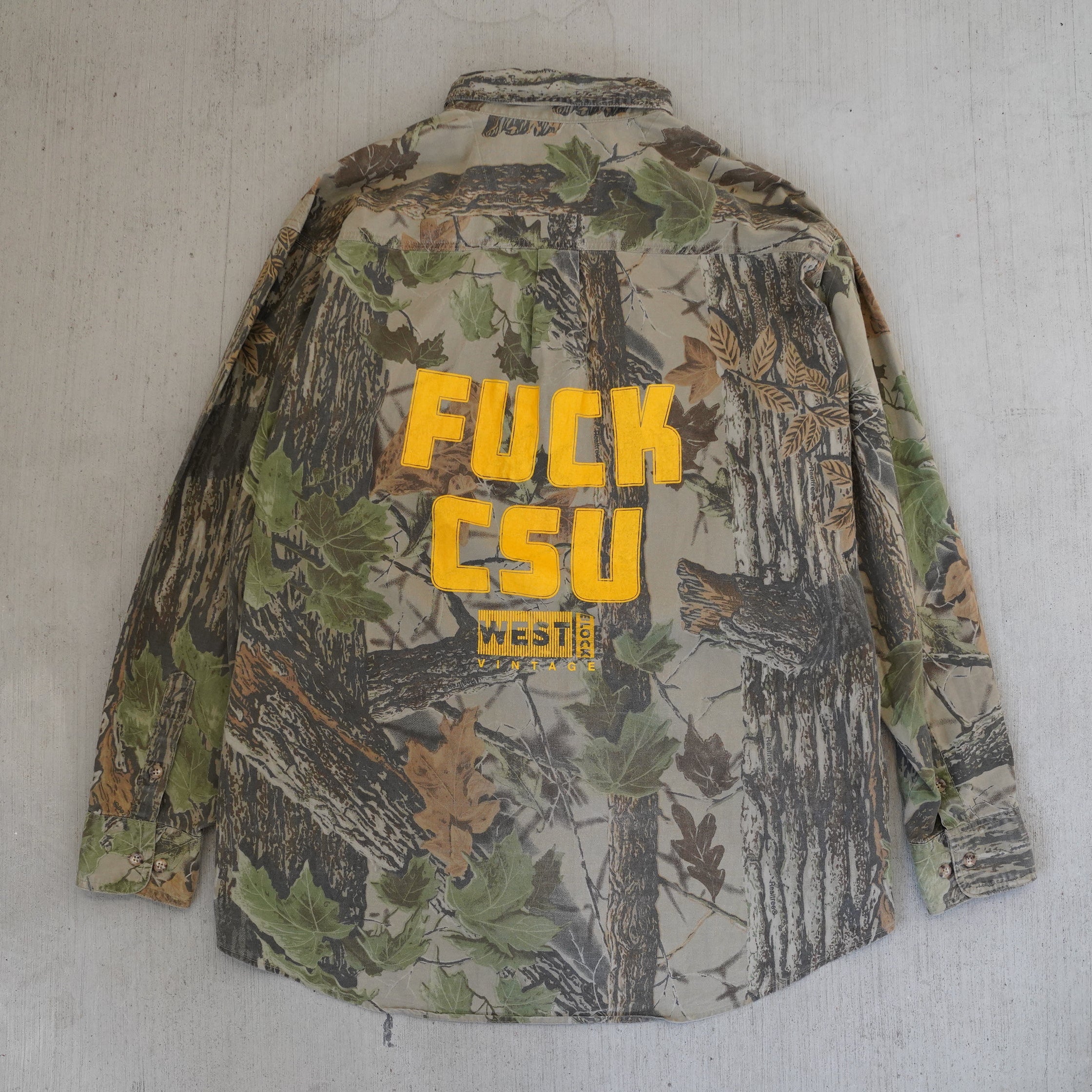 Reworked vintage 2000s Wrangler Rugged Wear camo field shirt – handcrafted Wyoming outdoor apparel from the Vintage Wyoming Gear Collection at West Block Vintage.