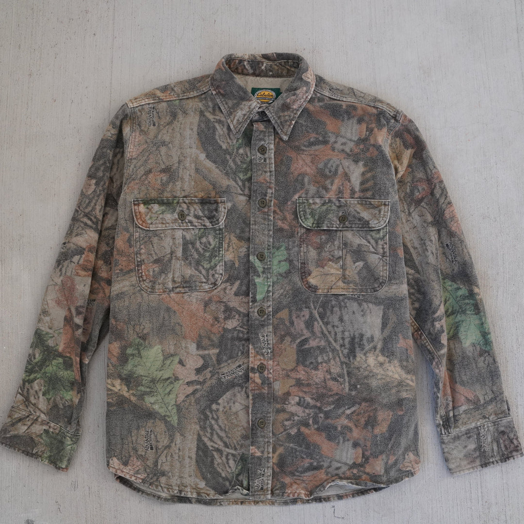 2000s Cabela’s Advantage Camo heavy cotton field shirt – reworked vintage outdoor wear from the Vintage Wyoming Gear Collection at West Block Vintage.