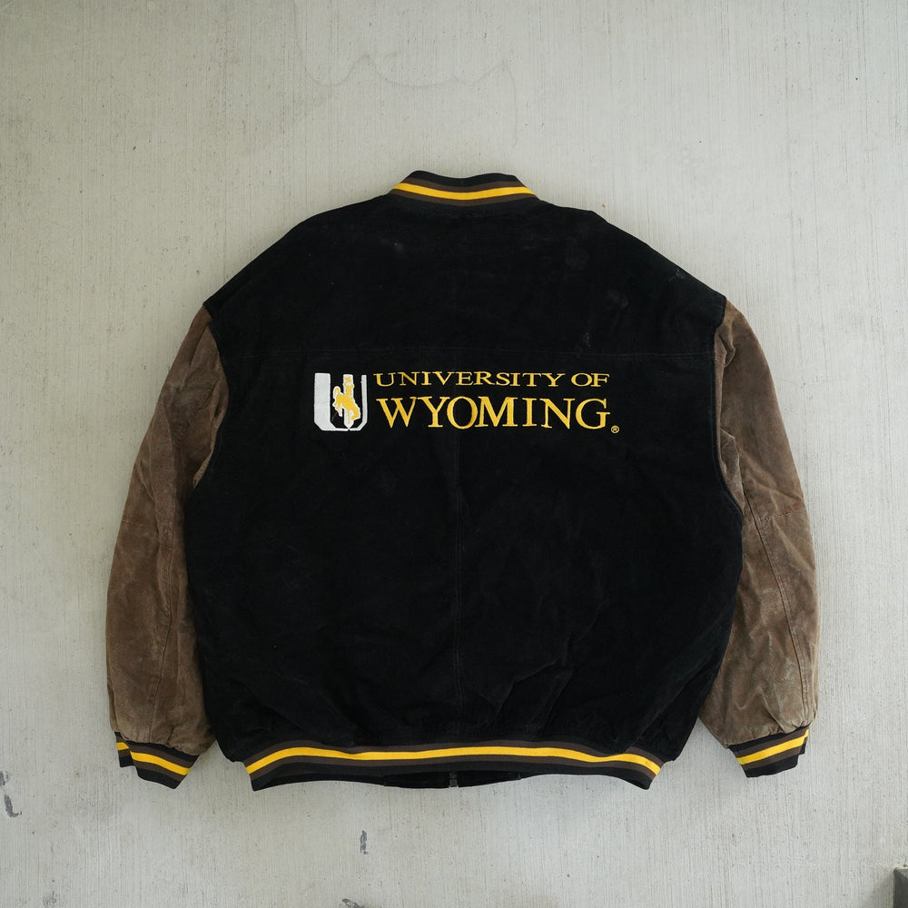 Vintage 1990s Wyoming Cowboys suede and leather varsity jacket with embroidered chest and back logos — Vintage Wyoming Gear Collection, West Block Vintage