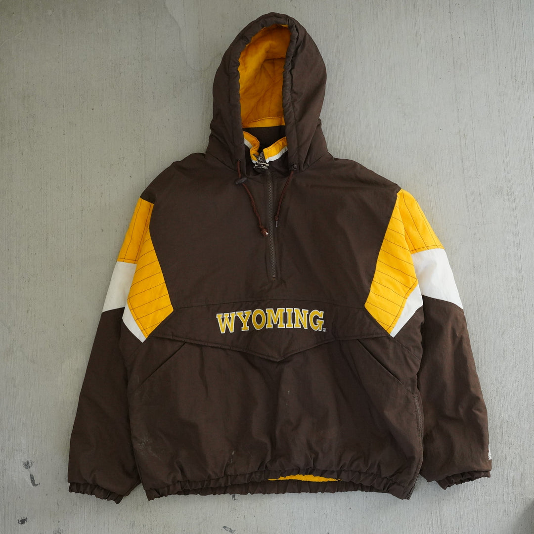 Vintage 1990s Wyoming Cowboys Starter anorak jacket in brown, gold, and white with embroidered logos — Vintage Wyoming Gear Collection, West Block Vintage.