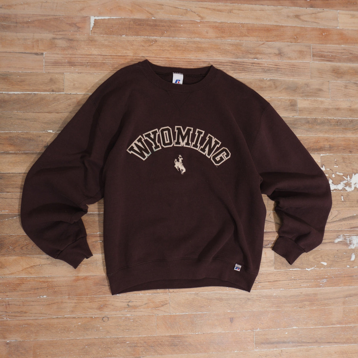 Mid-2000s Y2K Russell Athletic Wyoming Embroidered Arched Logo Crewneck, front view