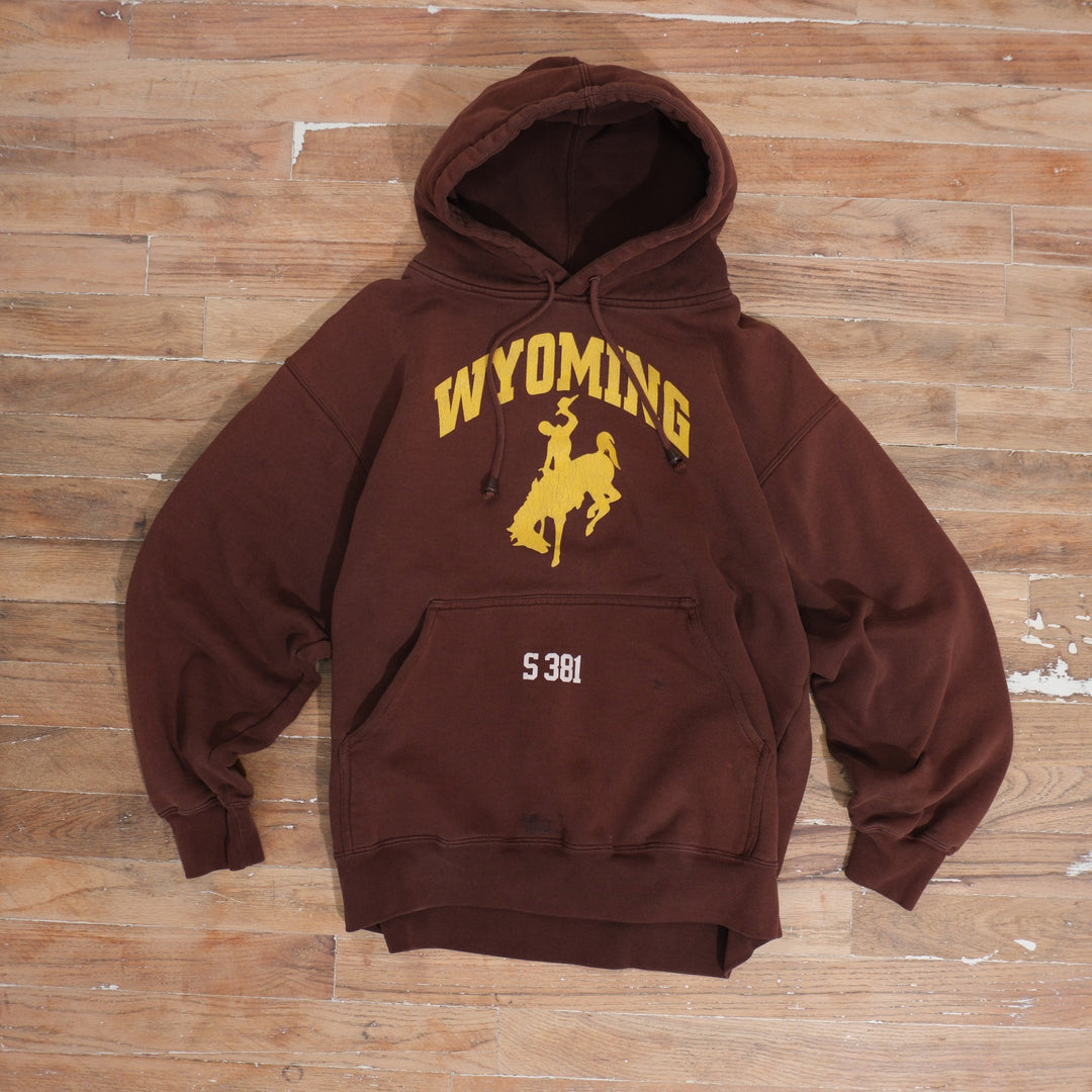 Mid-2000s faded brown Wyoming Cowboys rodeo Steamboat pullover hoodie with S381 pocket print