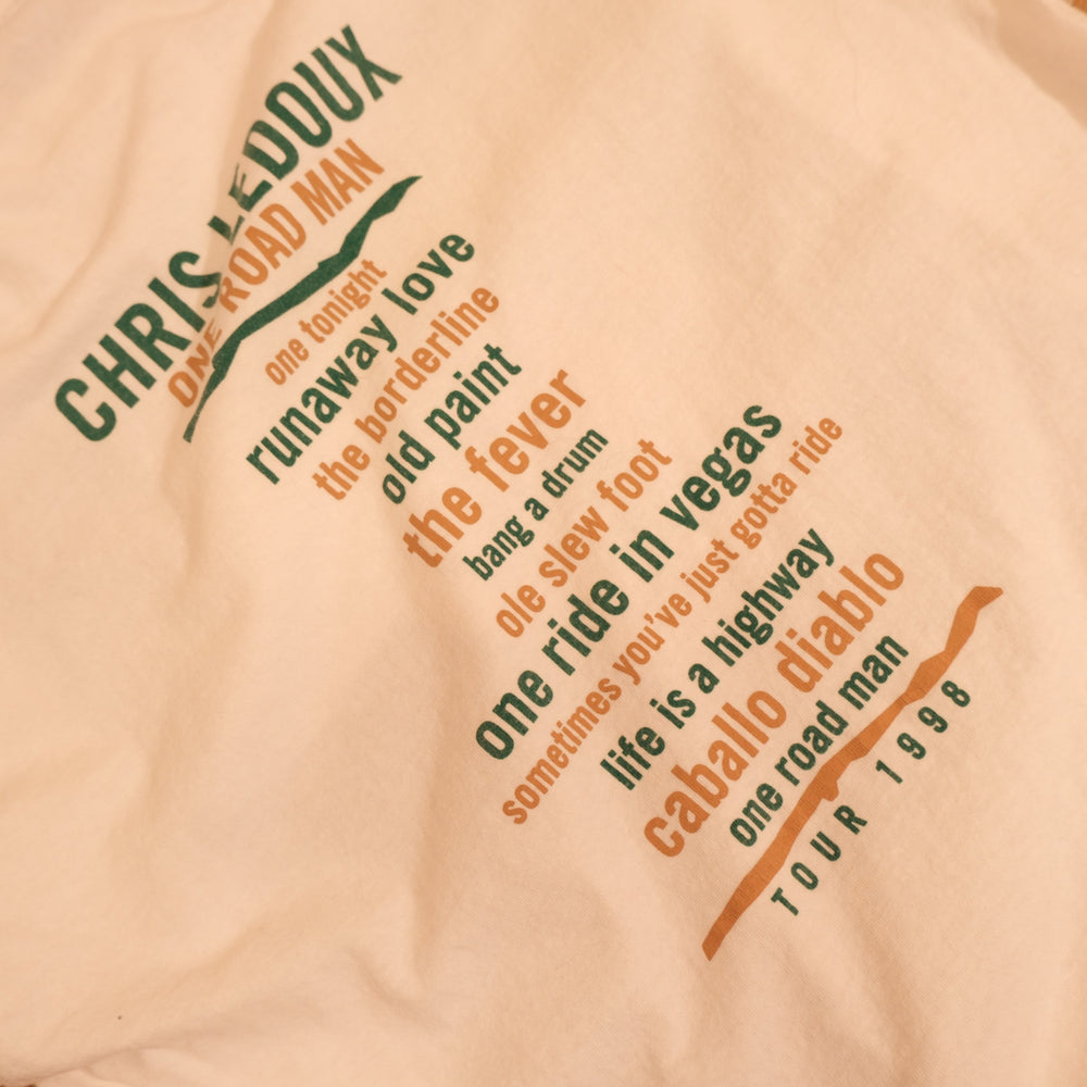 Back of 1998 Chris LeDoux One Road Man Tour T-shirt with green and orange song titles