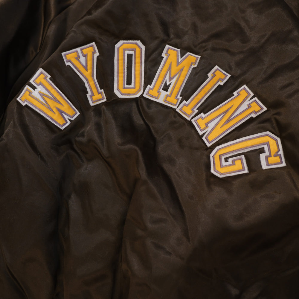 Detail of Wyoming embroidery on vintage 1980s varsity jacket