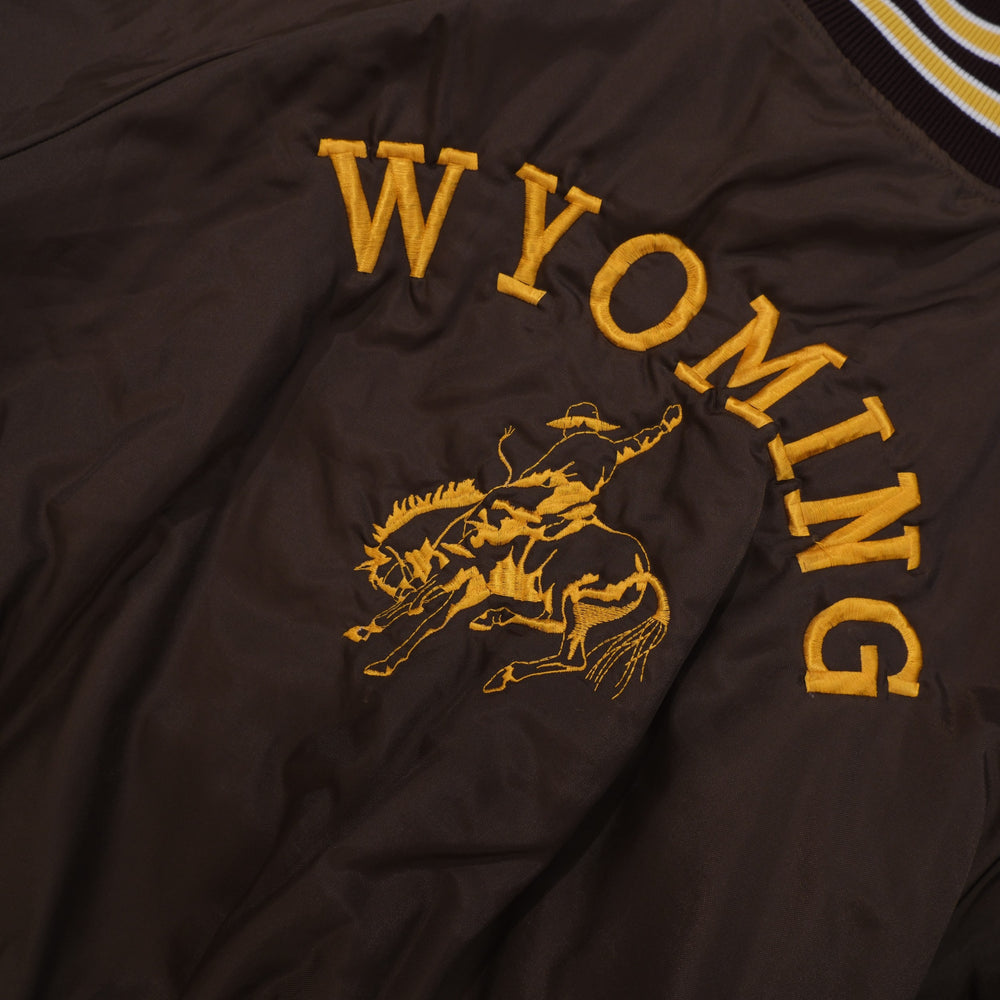 Detail of Wyoming embroidery on vintage 1980s bomber jacket
