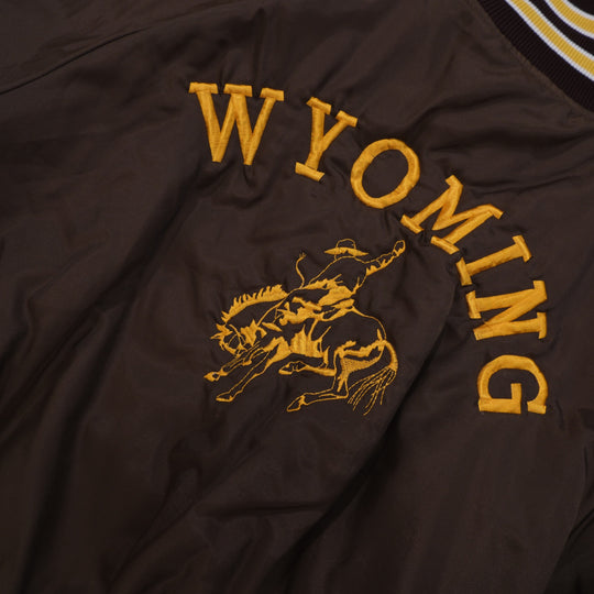 Detail of Wyoming embroidery on vintage 1980s bomber jacket