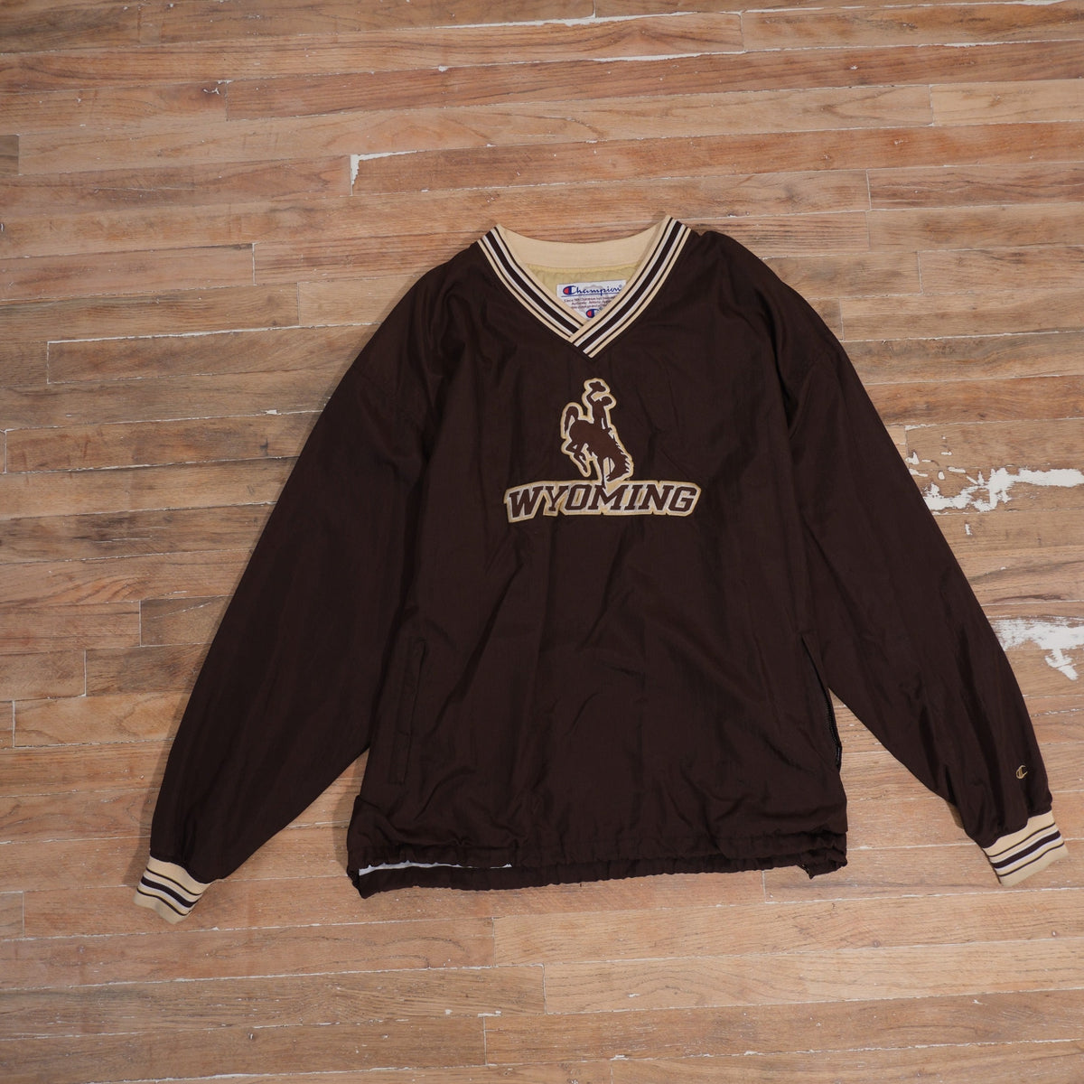 1990s 90s Champion Wyoming Cowboys Embroidered V-Neck Windbreaker, full garment front view