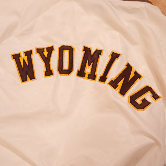 Detail of Wyoming embroidery on vintage 1980s bomber jacket