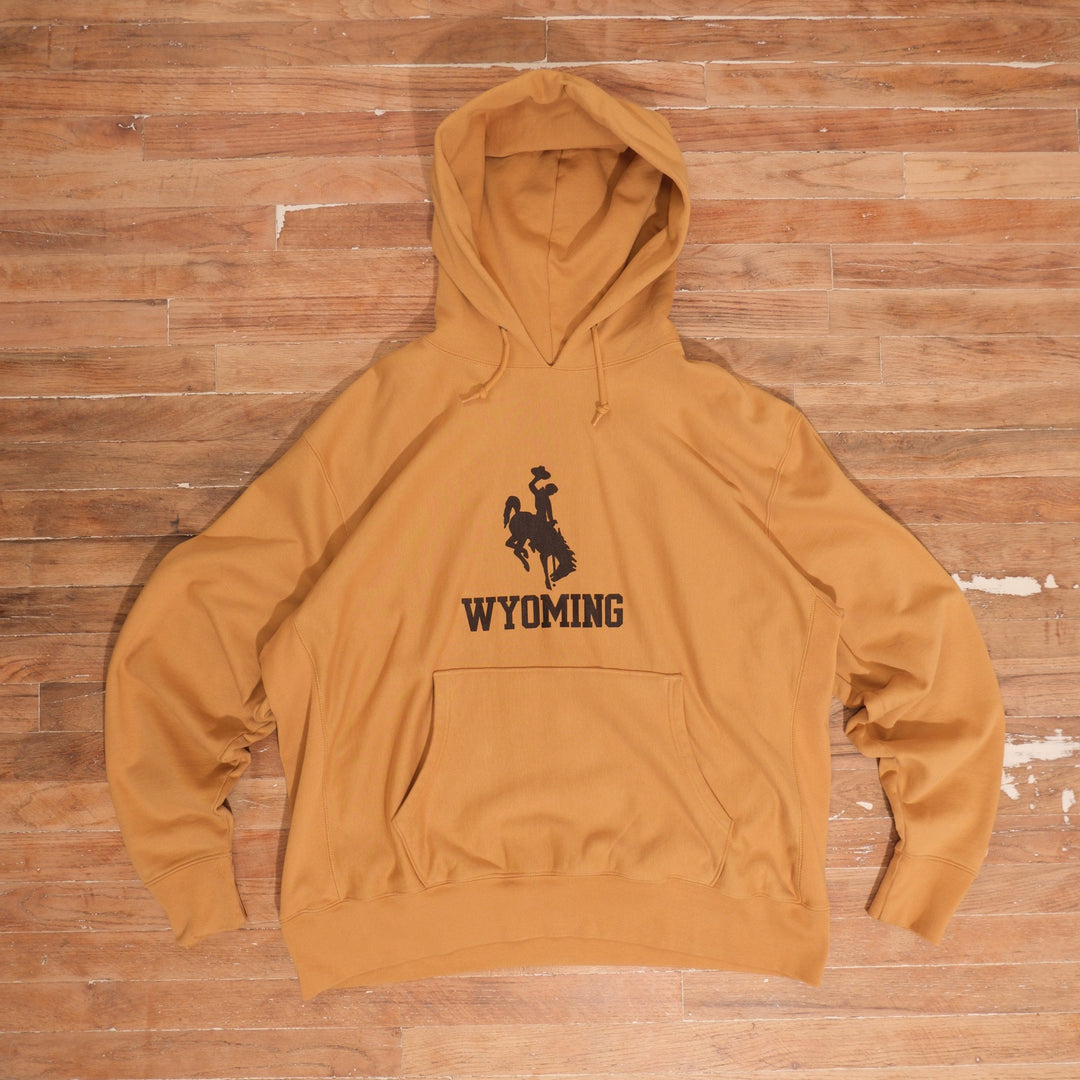 Mid-2000s Wyoming Cowboys prairie gold hoodie champion reverse weave wyoming prairie gold hoodie front flat lay