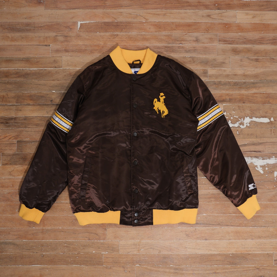 2000s Wyoming Cowboys brown / gold bomber jacket starter wyoming cowboys brown gold satin bomber jacket front flat lay