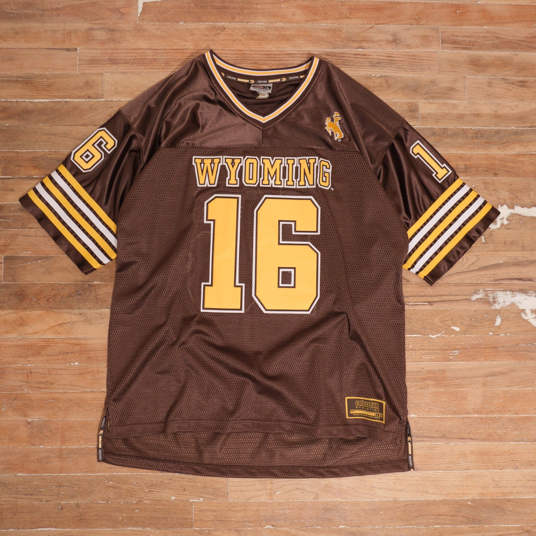 Mid-2000s Wyoming Cowboys brown / gold / white football jersey coliseum wyoming cowboys 16 heavyweight football jersey front flat lay