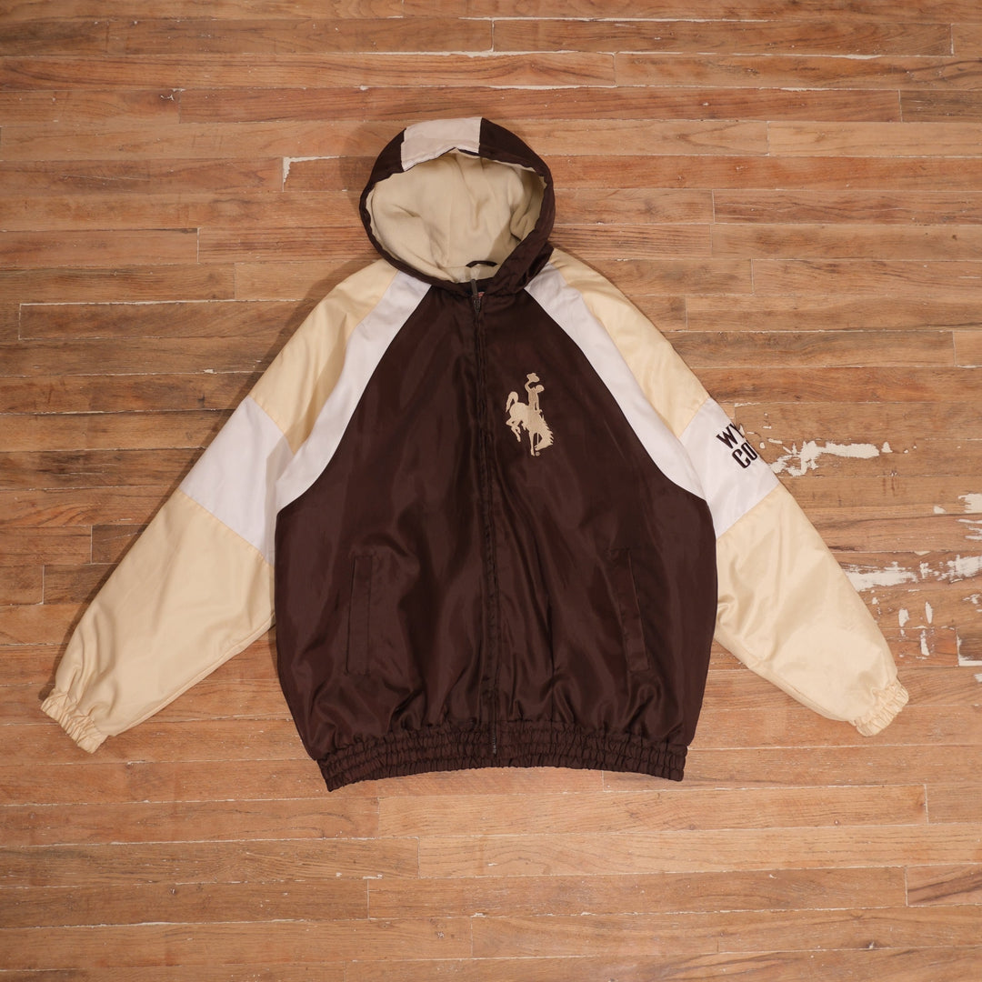 Y2K Wyoming Cowboys brown / cream / white winter jacket wyoming cowboys steamboat brown gold colorblock winter jacket front flat lay