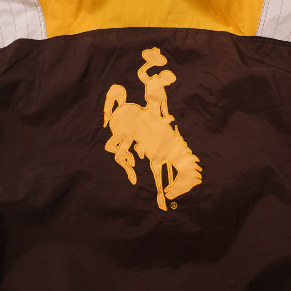 Mid-2000s Wyoming Cowboys brown / gold / white anorak windbreaker starter wyoming cowboys brown gold colorblock anorak windbreaker back embroidery detail