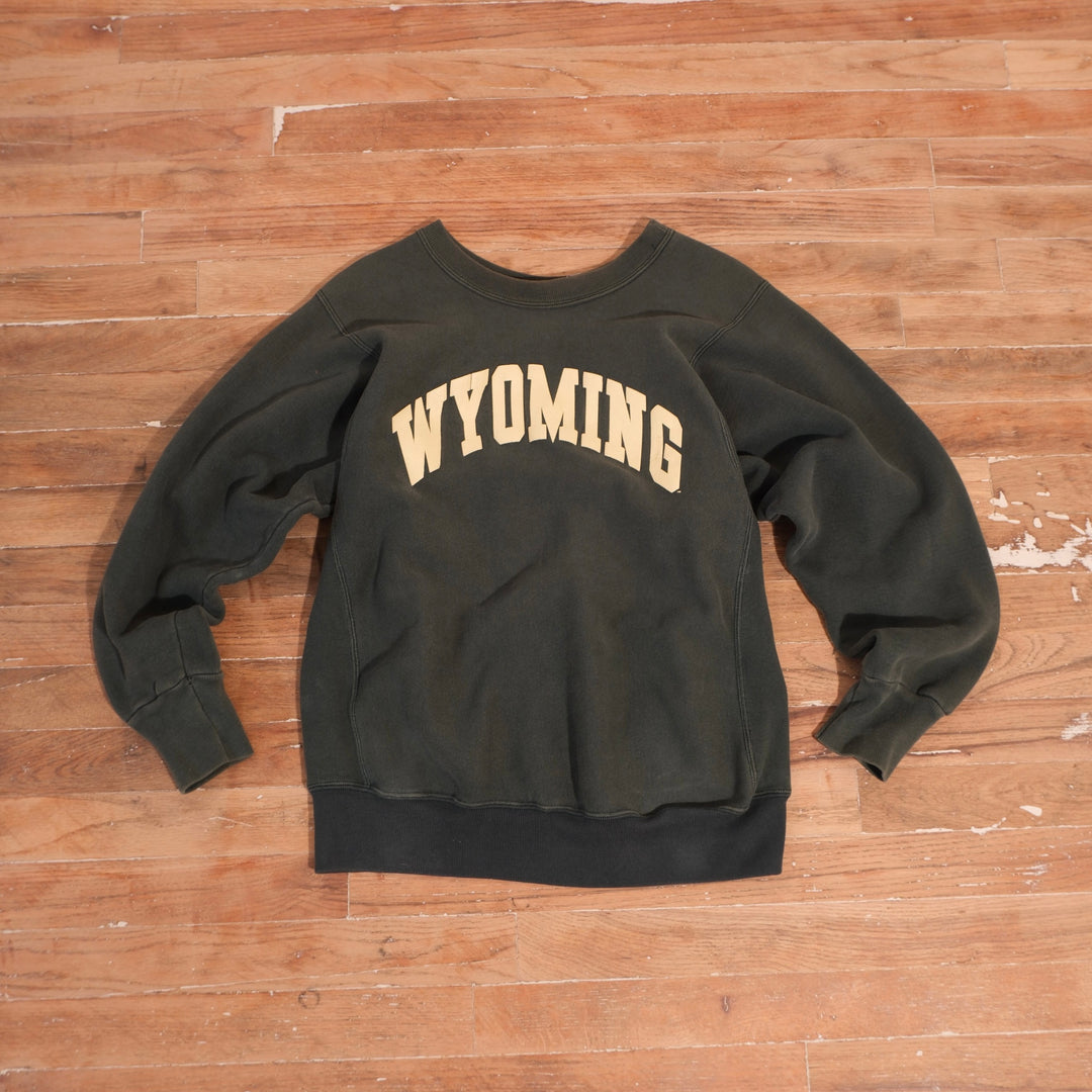 Early 1990s forest green University of Wyoming heavyweight crewneck with cream arched Wyoming screen print