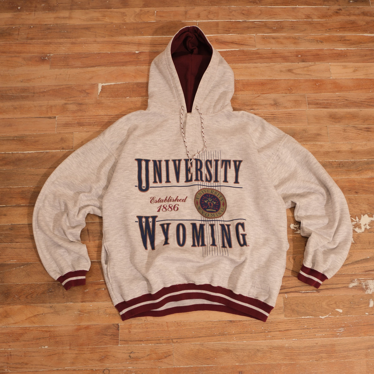 Vintage 1990s University of Wyoming Waffle Lined Varsity Hoodie in gray, front view