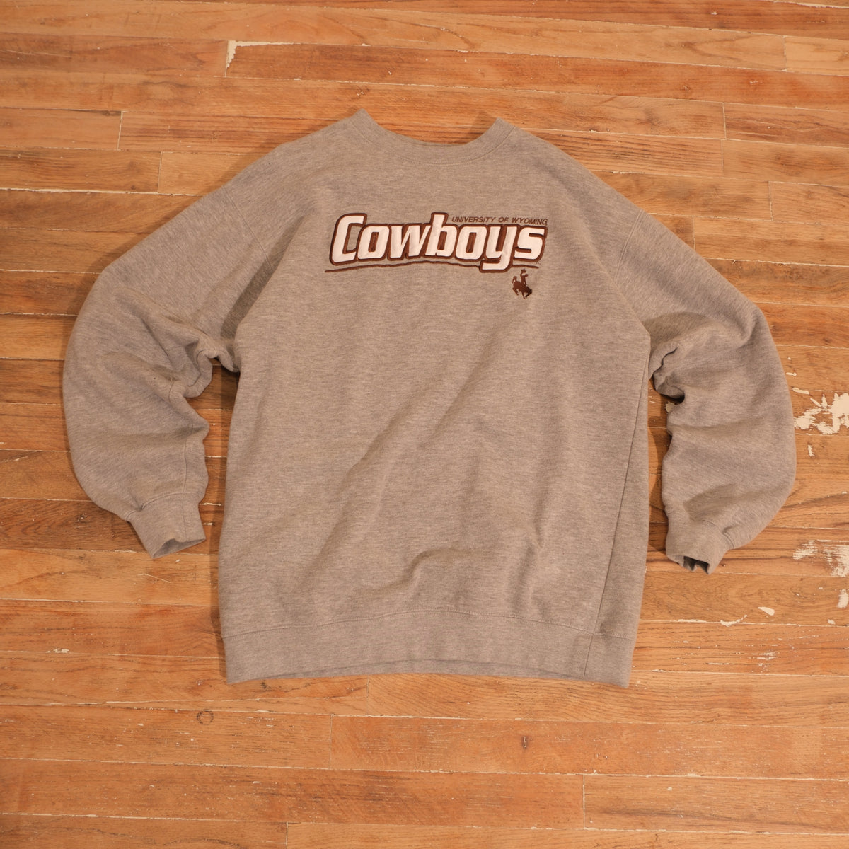 Vintage Y2K Wyoming Cowboys Embroidered Logo Crewneck in gray, front view